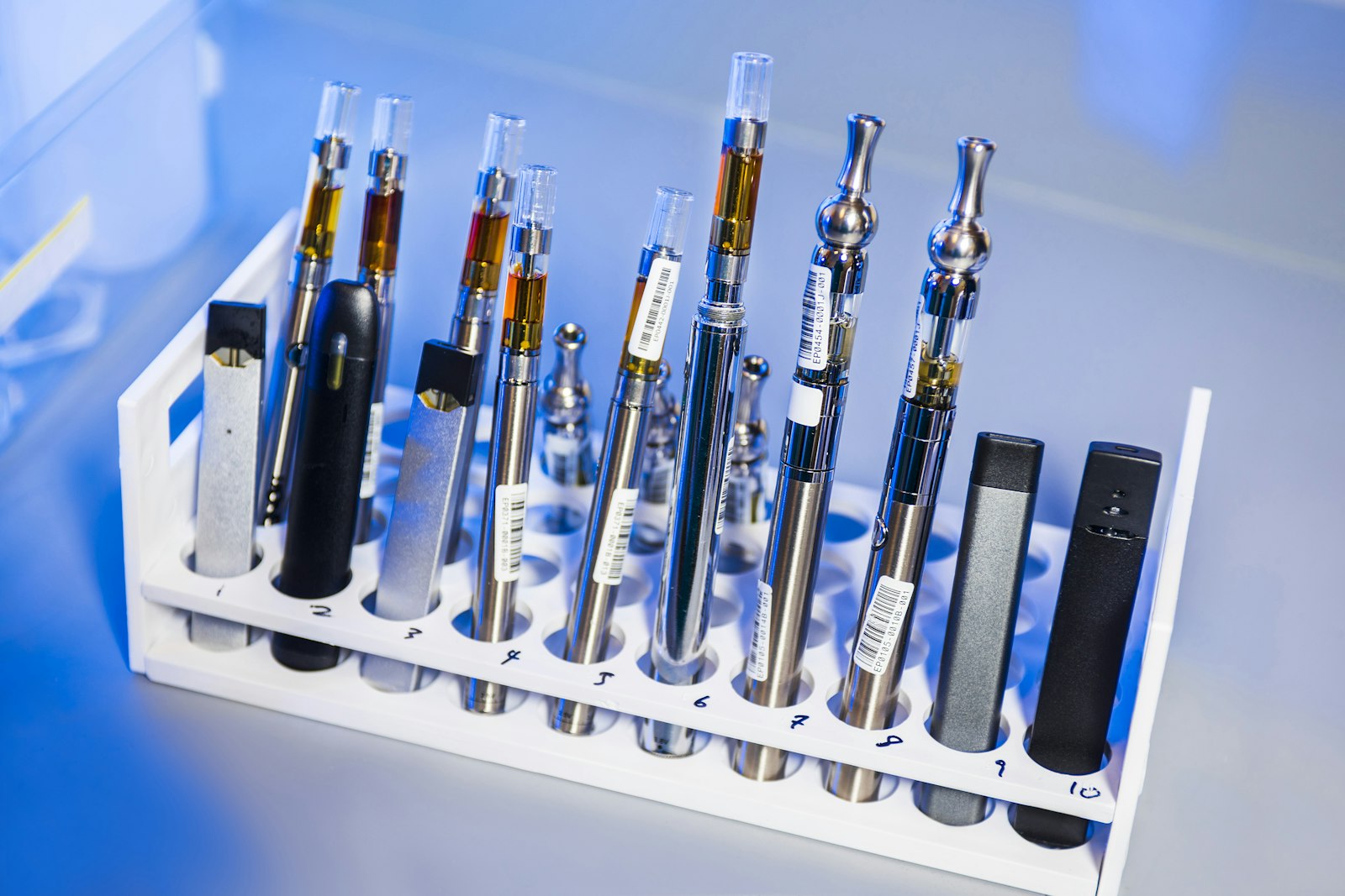 Cannabis vape cartridges and pens lined up